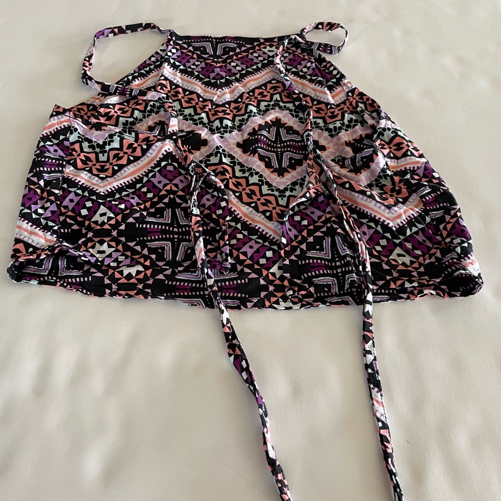 Express halter style top that ties in the back.
